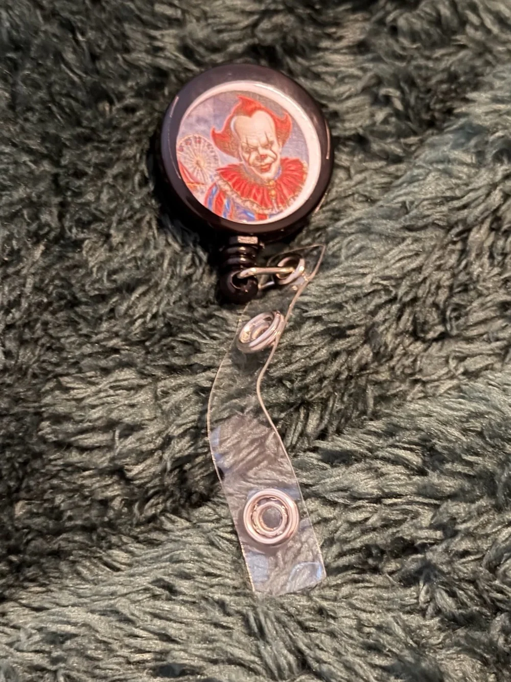 Black Retractable Badge Reel with Clown Graphic - Portable ID Holder